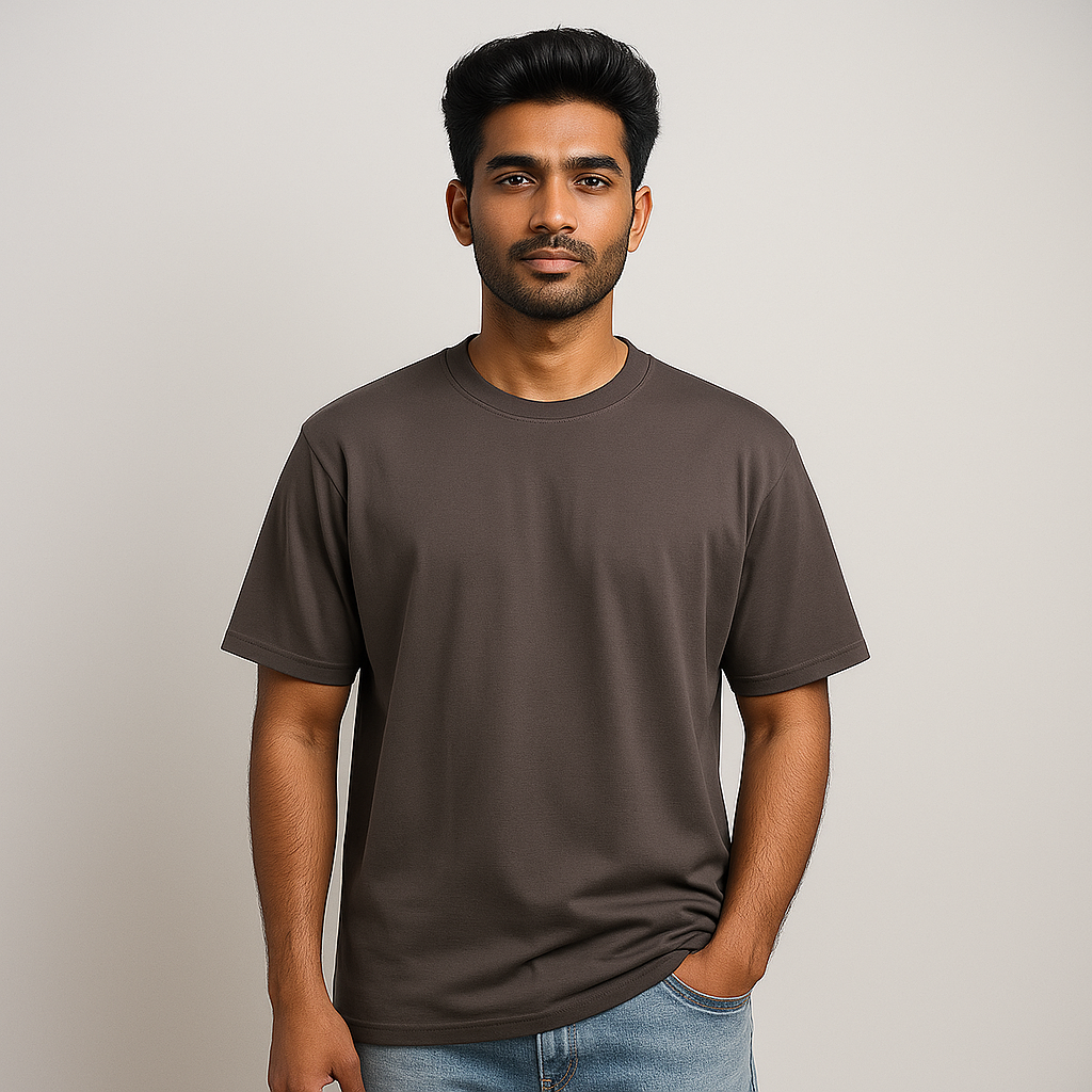 Man wearing a plain drop shoulder T-shirt in brown, showcasing premium cotton Lycra fabric.