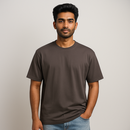 Man wearing a plain drop shoulder T-shirt in brown, showcasing premium cotton Lycra fabric.