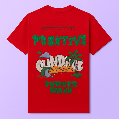 Red drop shoulder t-shirt featuring a colorful summer beach print with the words 'Positive Vibes' and 'Summer Beach'.